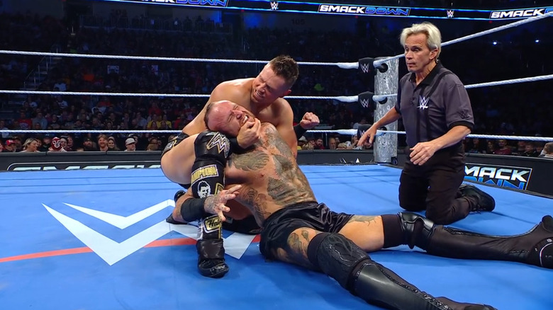 Miz with a submission locked in on Black