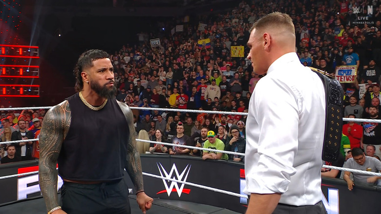 Jey and GUNTHER staring each other down in the ring
