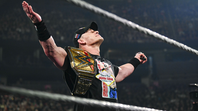 John Cena spreads his arms wide and closes his eyes on "WWE Raw"