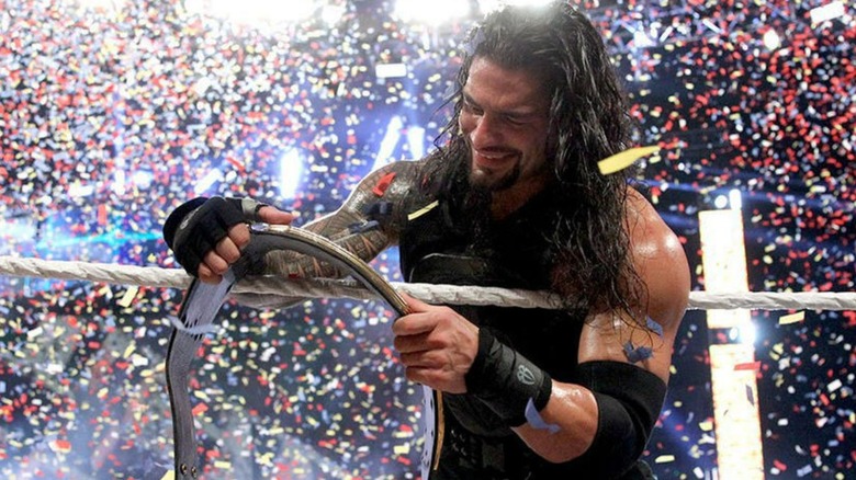 Roman looks at belt
