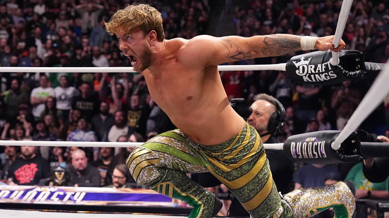 Will Ospreay shouts as he lunges forward from the ropes.