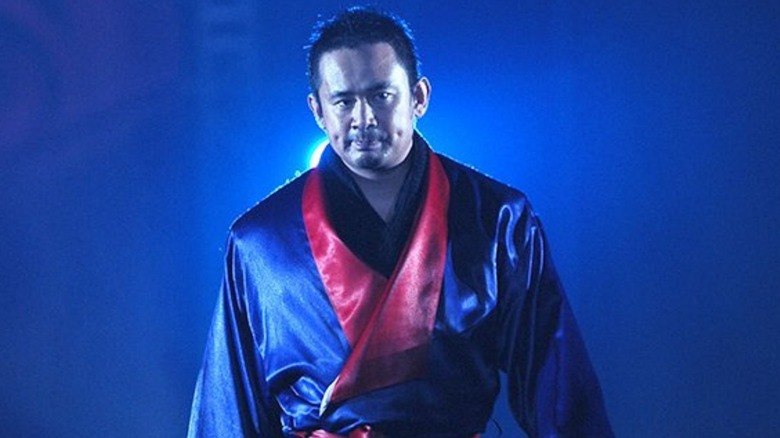 Osamu Nishimura walks to the ring from the ramp during a NJPW event.