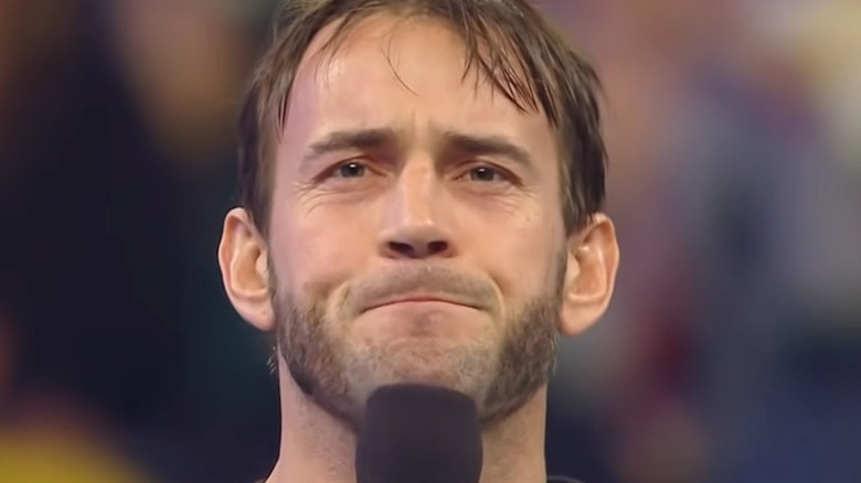 CM Punk holds mic